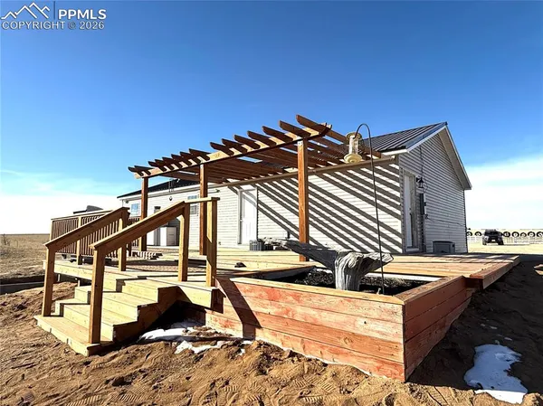 a view of a house with roof deck
