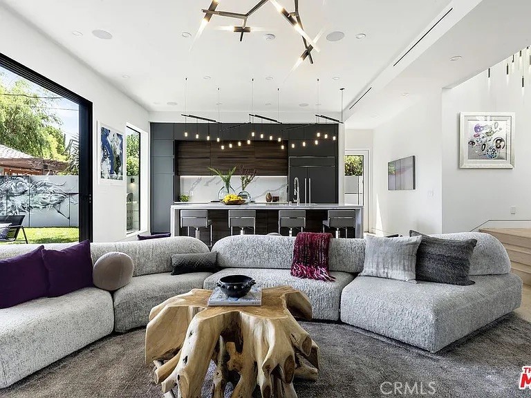 12132 Otsego Street Valley Village, CA 91607 - Photo 13 of 75 a living room with furniture and a large window