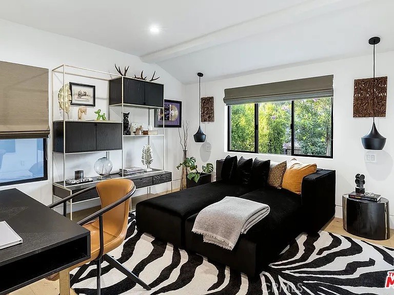 12132 Otsego Street Valley Village, CA 91607 - Photo 28 of 75 a living room with furniture and a flat screen tv