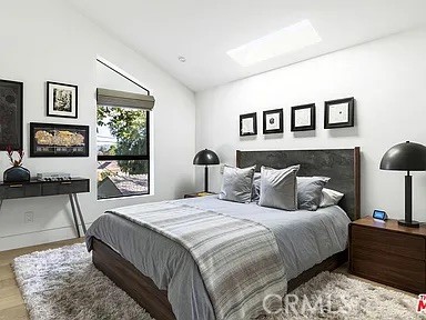 12132 Otsego Street Valley Village, CA 91607 - Photo 38 of 75 a bedroom with bed and a night stand