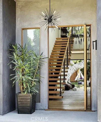 a view of a livingroom with furniture window and outside view