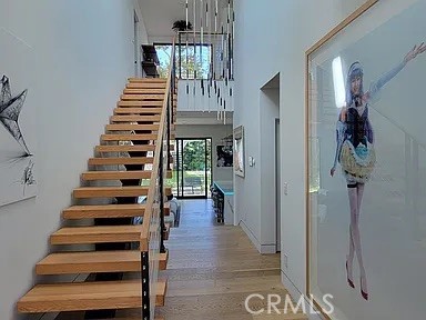 12132 Otsego Street Valley Village, CA 91607 - Photo 48 of 75 a view of entryway and hall with wooden floor