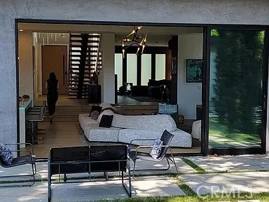 a kitchen with a sink cabinets and appliances