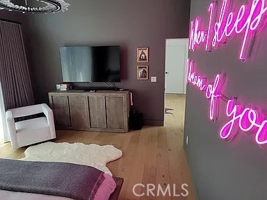 12132 Otsego Street Valley Village, CA 91607 - Photo 59 of 75 a bedroom with a bed and a television