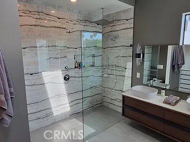 12132 Otsego Street Valley Village, CA 91607 - Photo 62 of 75 a bathroom with a sink and a shower