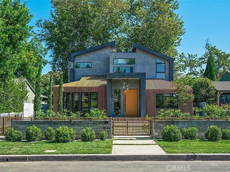 12132 Otsego Street Valley Village, CA 91607 - Photo 70 of 75 a front view of a house with a garden