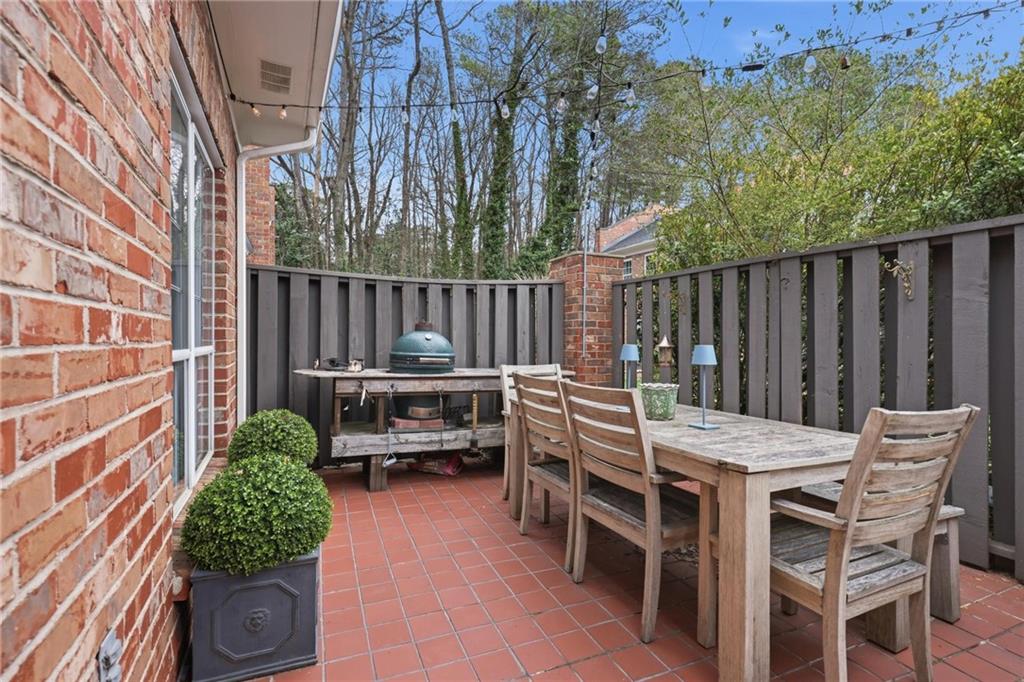 24 Independence Place Northwest Atlanta, GA 30318 - Photo 13 of 28 a view of a chairs and table in the patio