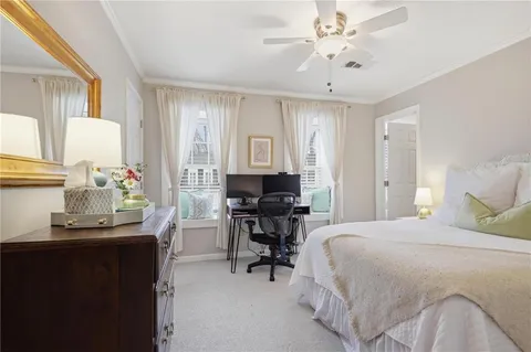 a bedroom with a bed and a table