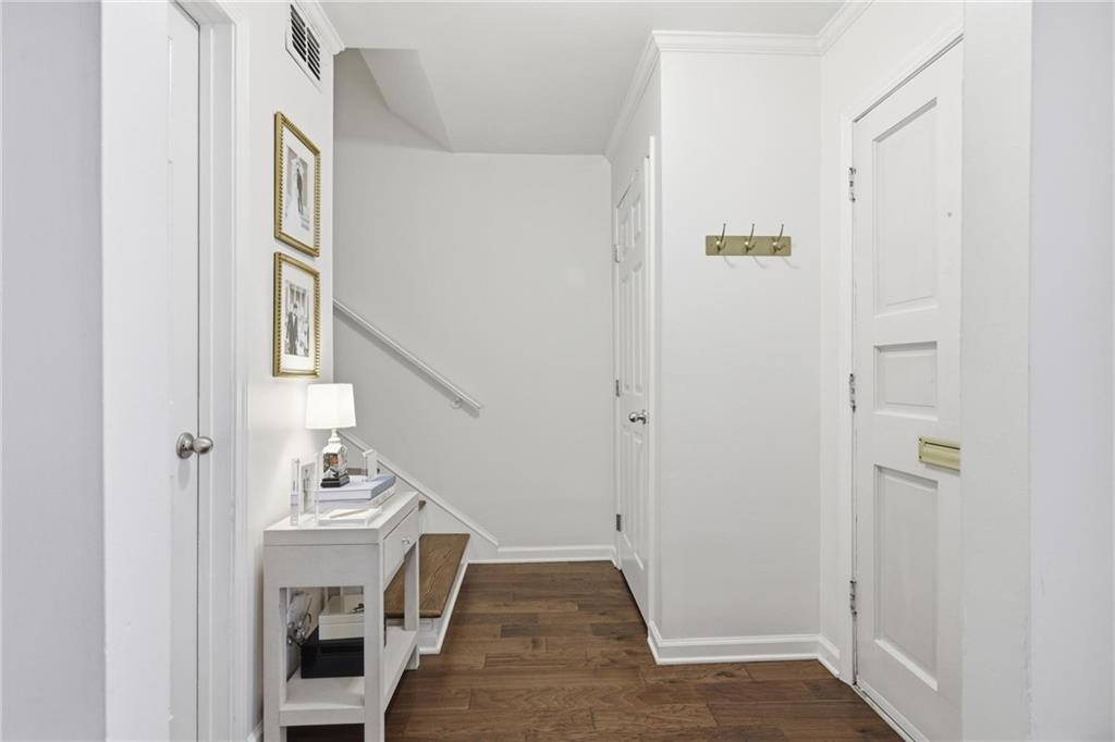 24 Independence Place Northwest Atlanta, GA 30318 - Photo 26 of 28 a view of entryway with wooden floor and stairs