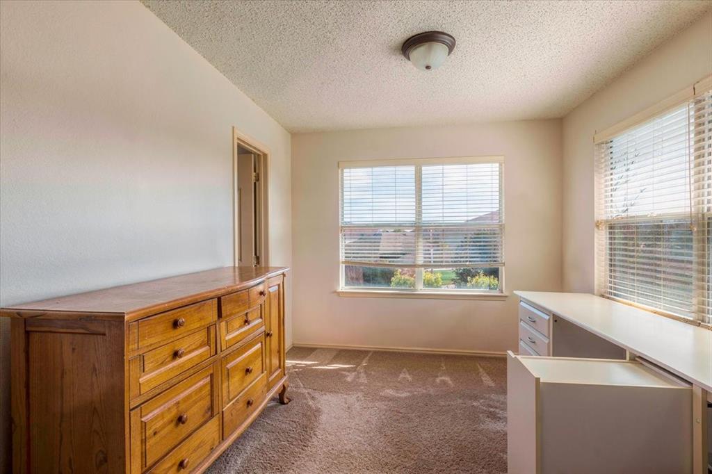 1606 Withers Way Krum, TX 76249 - Photo 15 of 35 a view of an empty room with a window