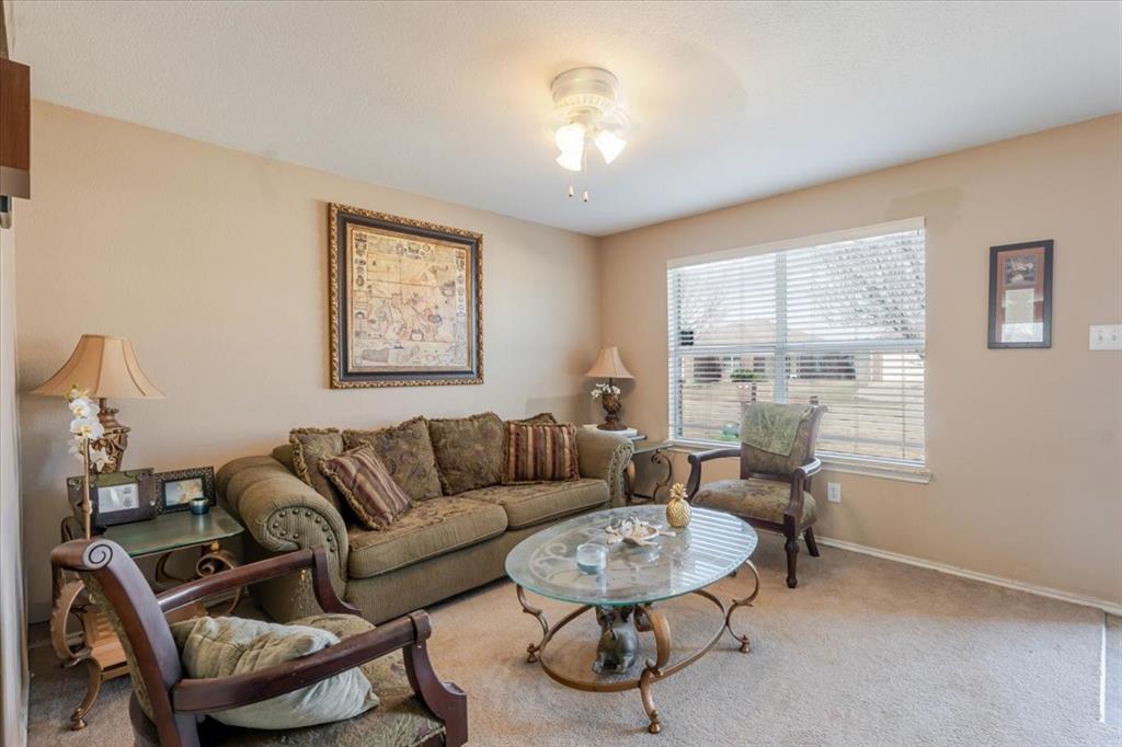 1606 Withers Way Krum, TX 76249 - Photo 2 of 35 a living room with furniture and a large window