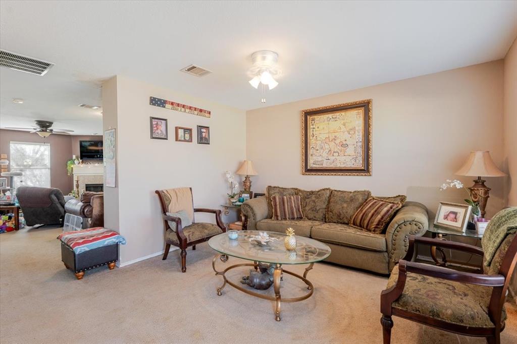 1606 Withers Way Krum, TX 76249 - Photo 27 of 35 a living room with furniture