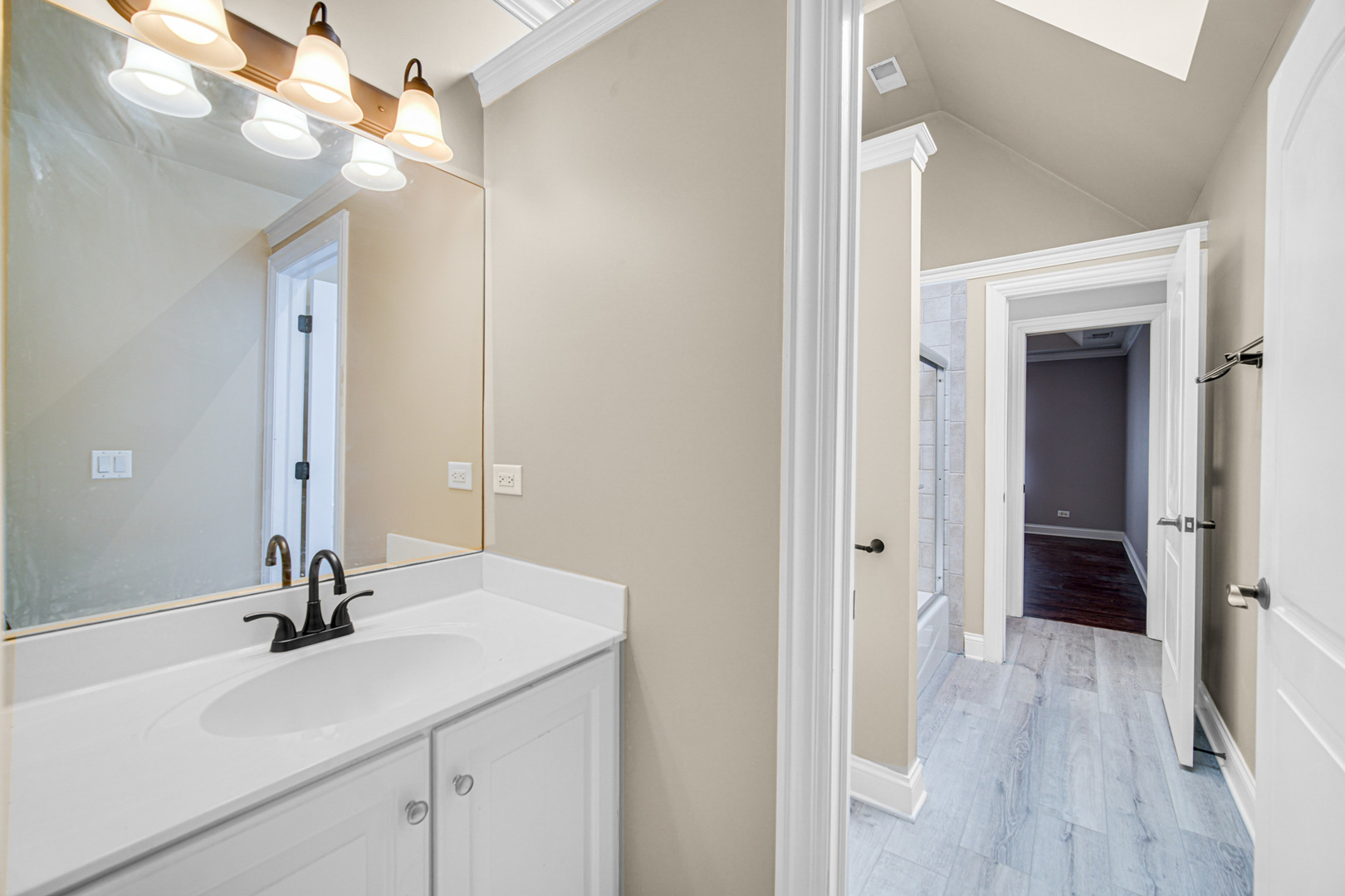3N777 Walt Whitman Road St. Charles, IL 60175 - Photo 17 of 29 a bathroom with a sink and a mirror