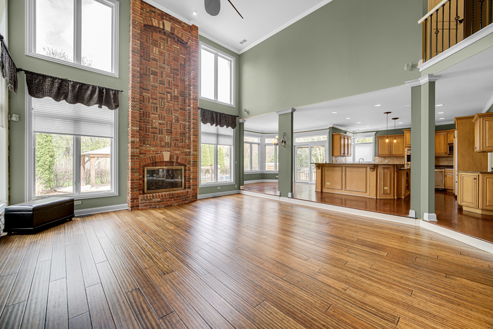3N777 Walt Whitman Road St. Charles, IL 60175 - Photo 4 of 29 a view of an empty room with wooden floor and a window