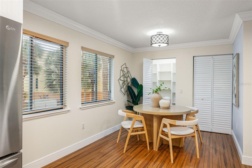 533 Sandy Hook Road Treasure Island, FL 33706 - Photo 17 of 46 a dining room with furniture and window