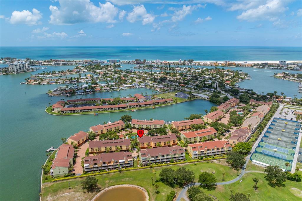 533 Sandy Hook Road Treasure Island, FL 33706 - Photo 40 of 46 an aerial view of a city with ocean view