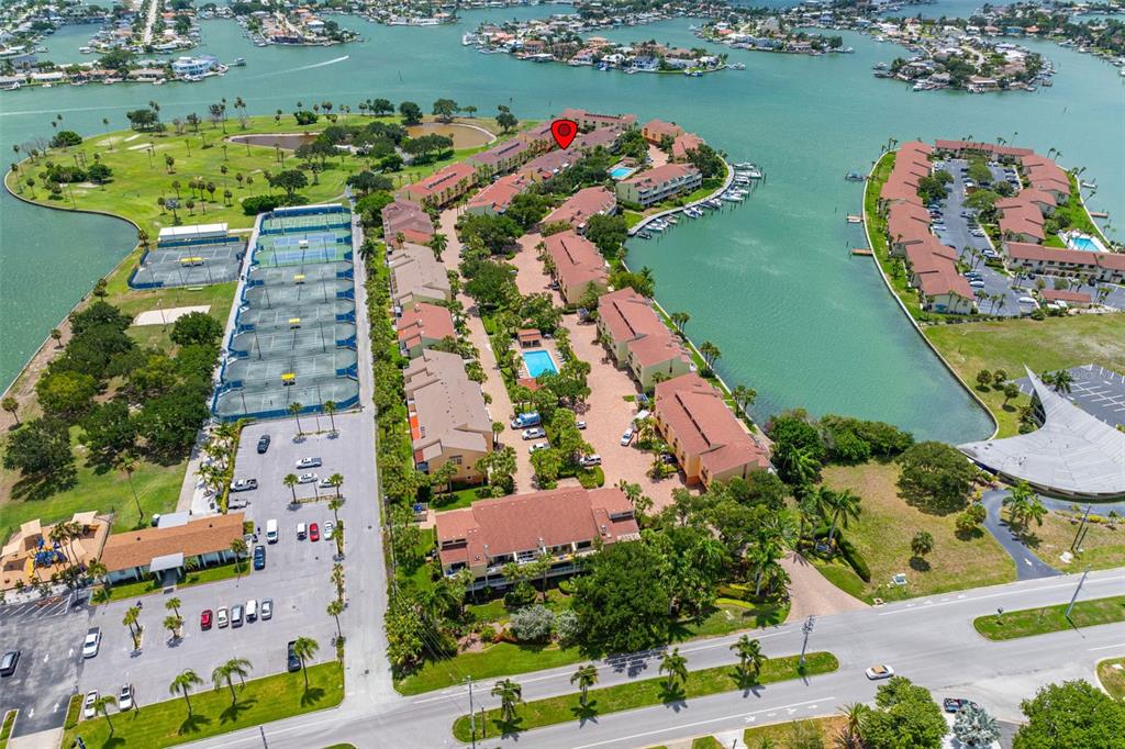533 Sandy Hook Road Treasure Island, FL 33706 - Photo 43 of 46 an aerial view of a house with a lake view