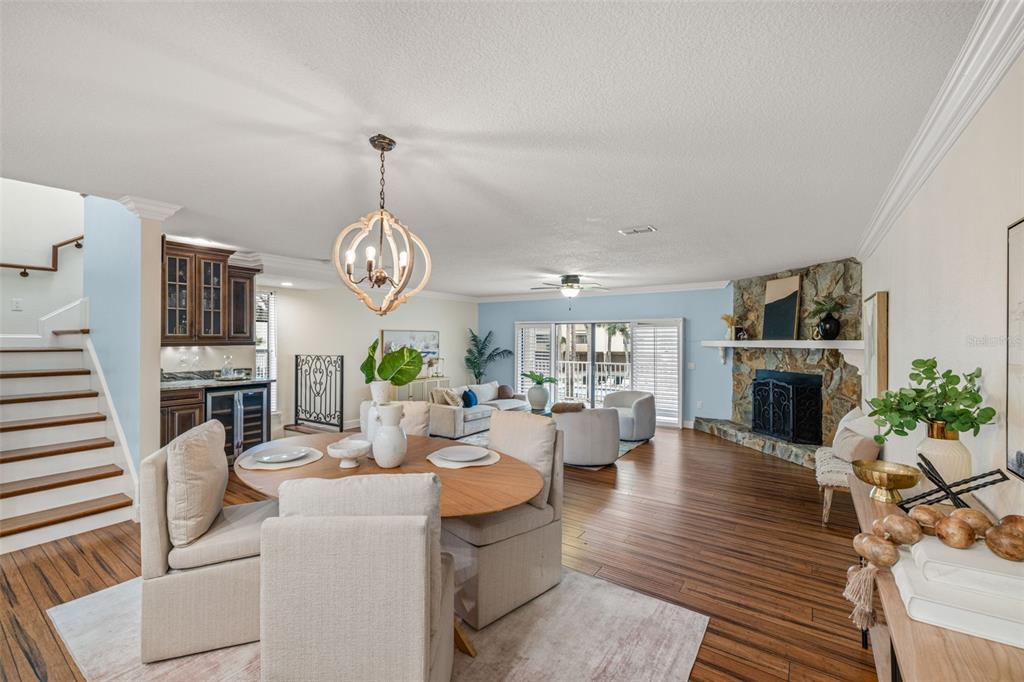 533 Sandy Hook Road Treasure Island, FL 33706 - Photo 7 of 46 a living room with fireplace furniture and a fireplace