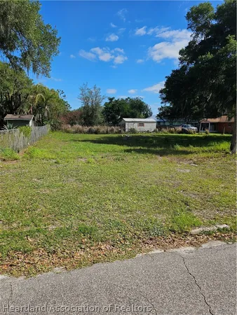 a view of a lake with a big yard
