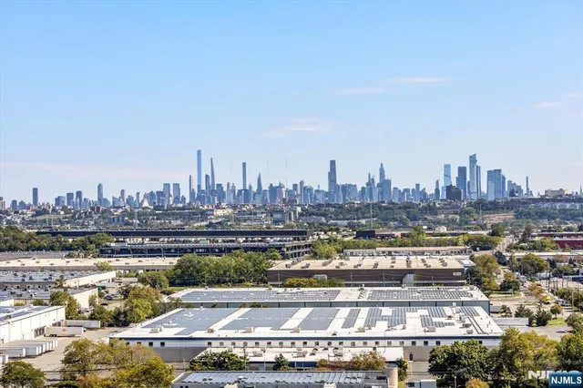 a view of a city with tall buildings