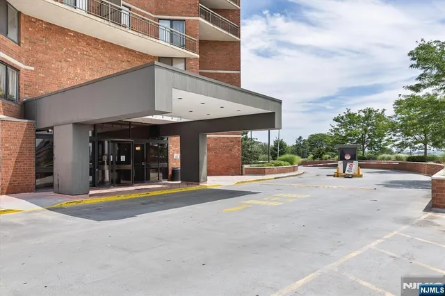 a view of a brick building with a large windows