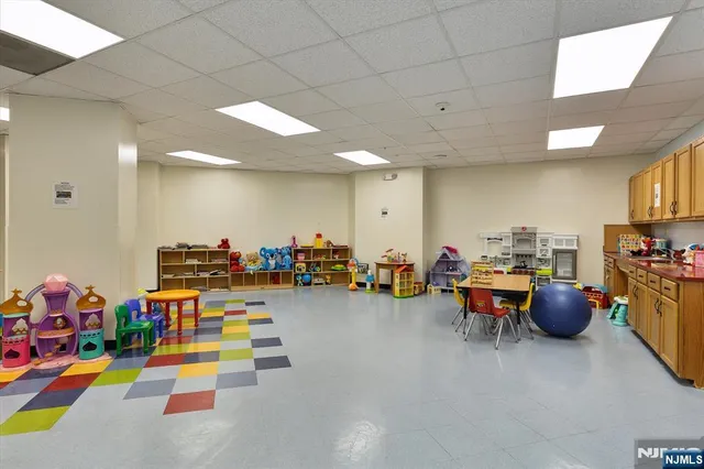 a play room with lots of furniture