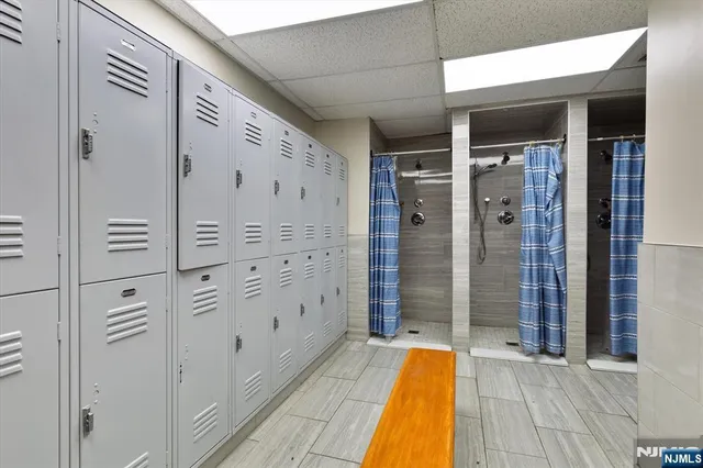 a view of walk in closet with window