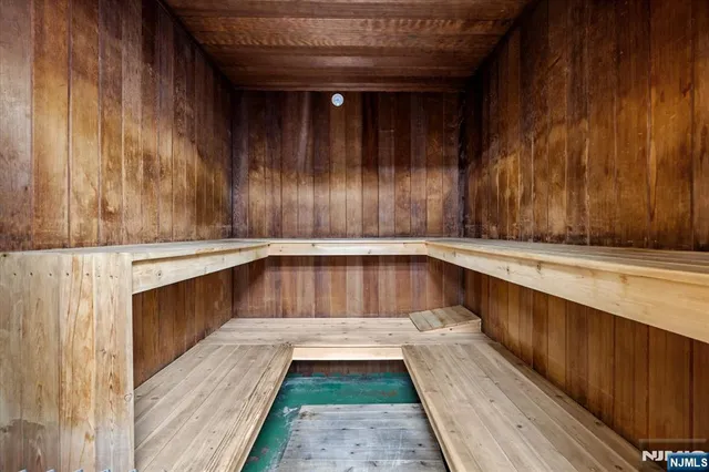 a view of a balcony with wooden floor