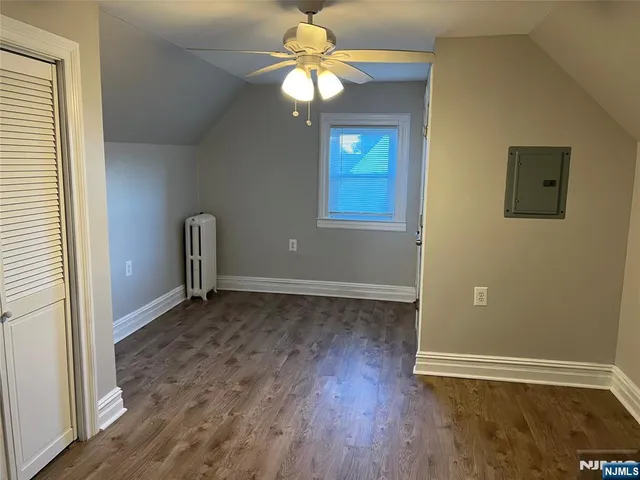 a kitchen with a sink a stove and cabinets