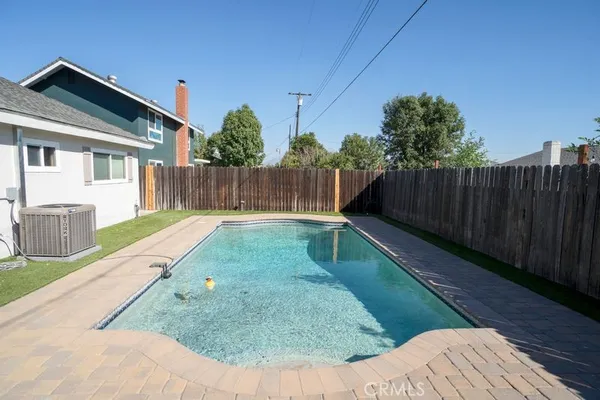 a view of a backyard with a small cabin