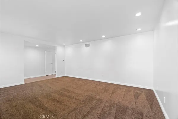 an empty room with an entryway