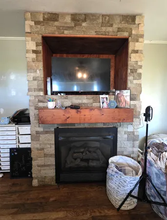 a room with fireplace and living room