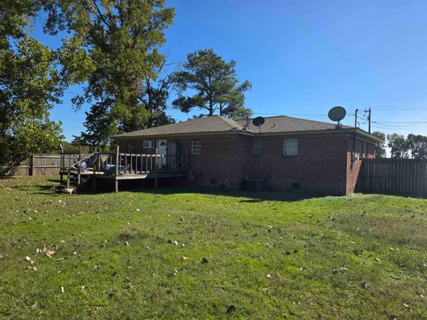 a house view with a garden space