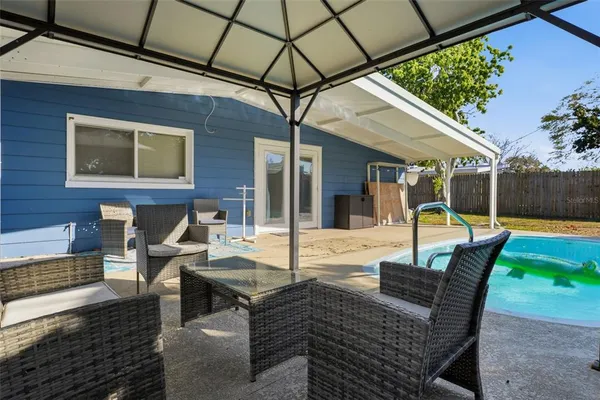 a view of outdoor space yard deck patio and swimming pool
