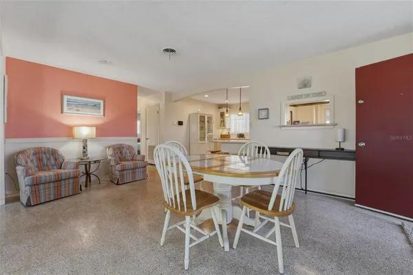 a view of a dining room with furniture