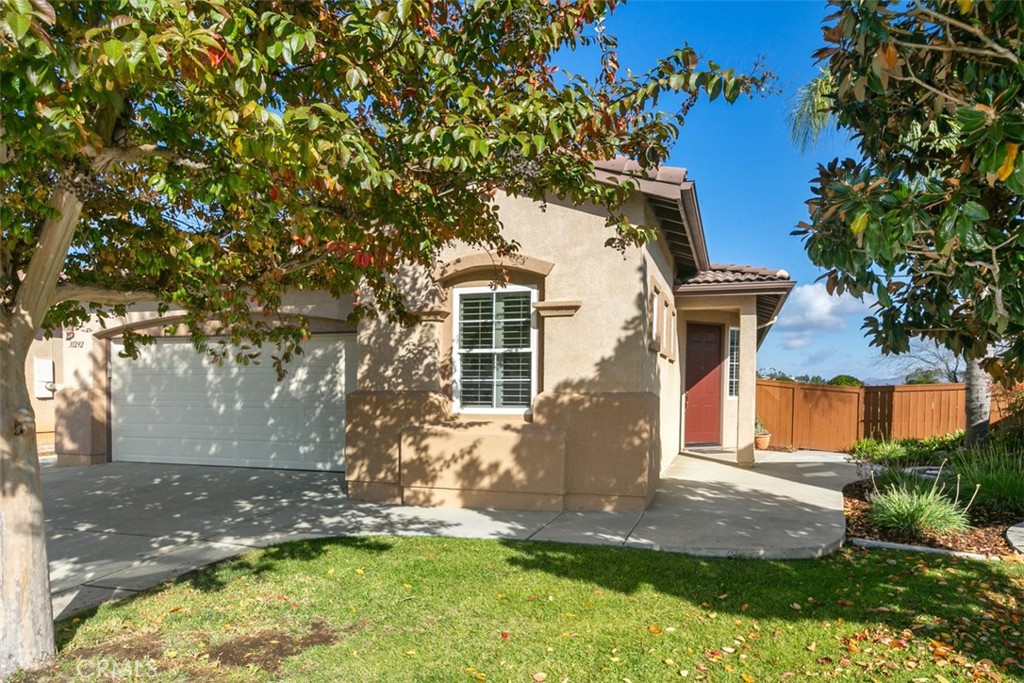31292 Firestone Street Temecula, CA 92591 - Photo 1 of 19 front view of house with a yard