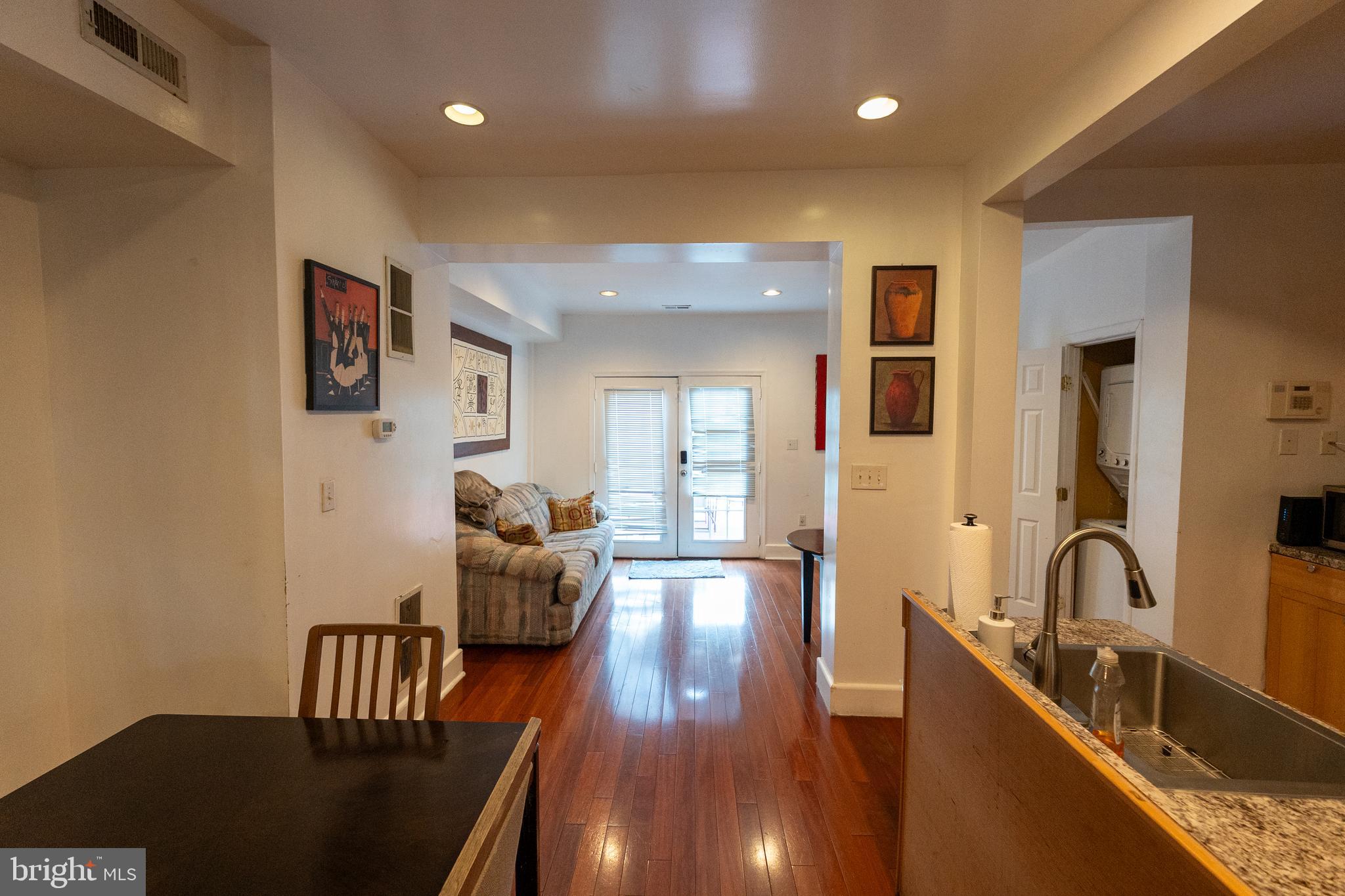 4705 8th Street Northwest Washington, DC 20011 - Photo 11 of 30 a living room with furniture and wooden floor