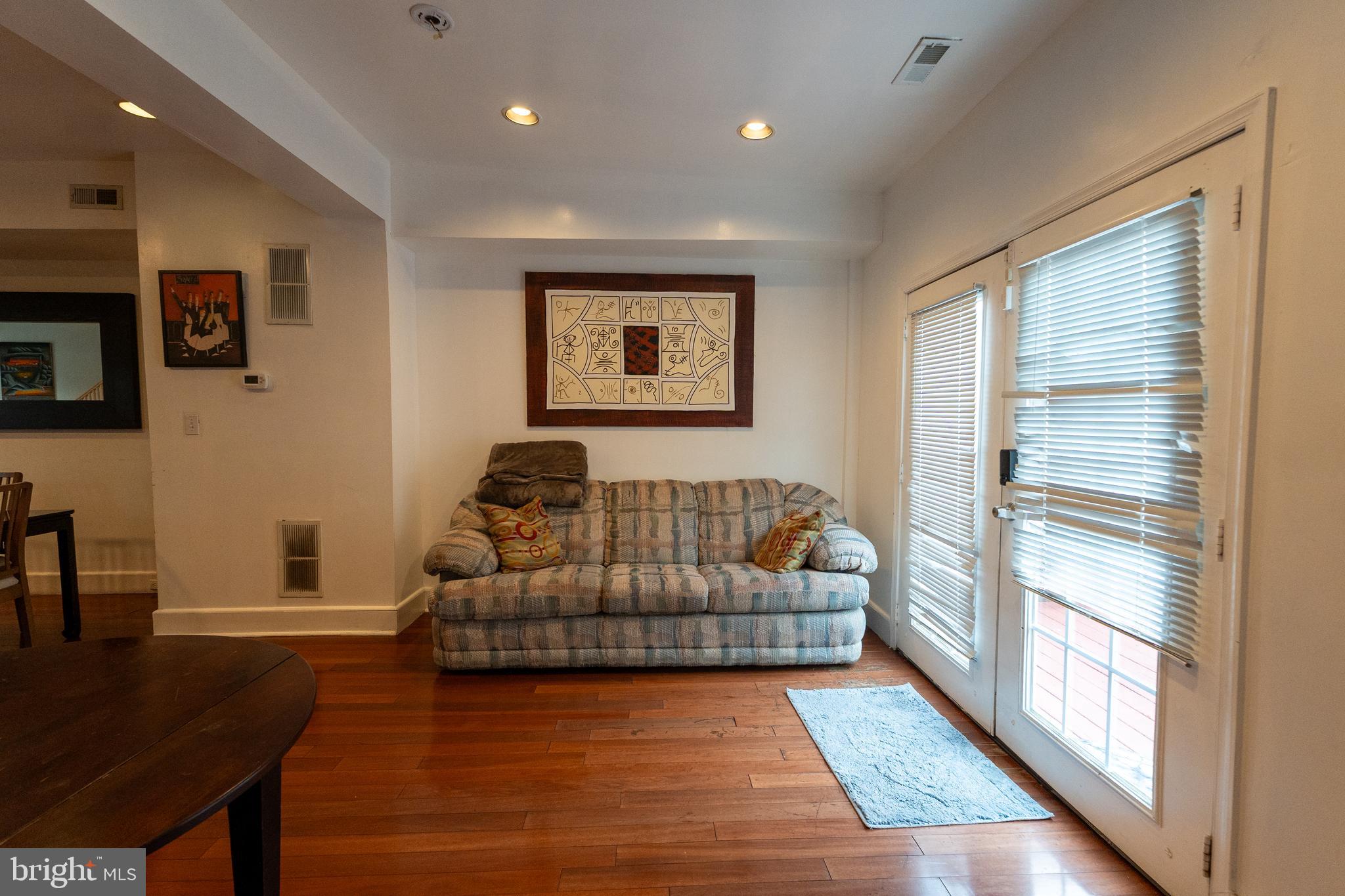 4705 8th Street Northwest Washington, DC 20011 - Photo 3 of 30 a living room with furniture and a window