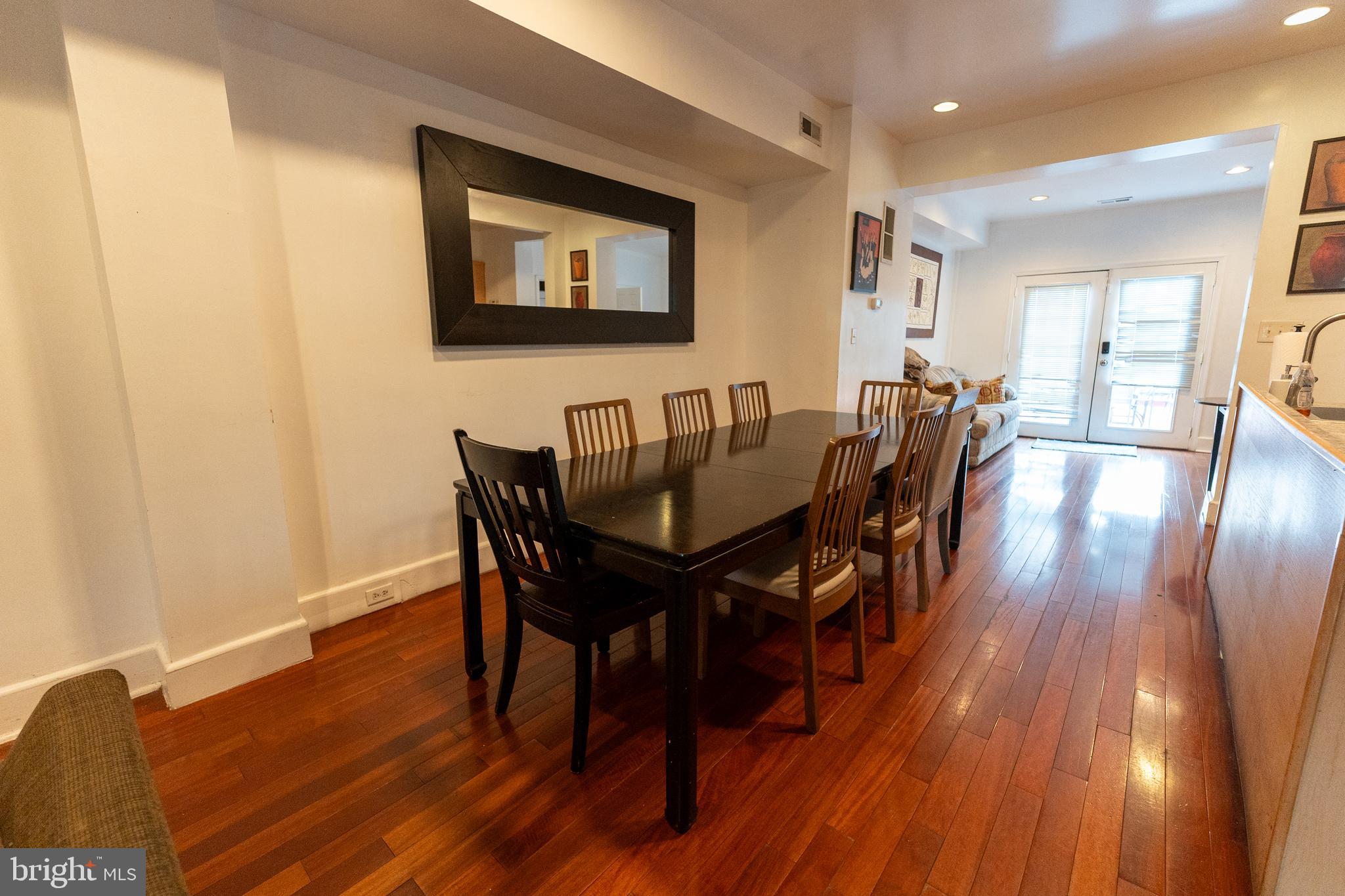4705 8th Street Northwest Washington, DC 20011 - Photo 6 of 30 a view of a dining room with furniture and wooden floor