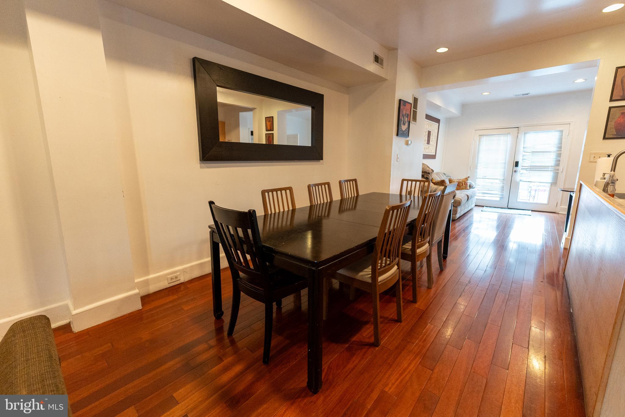 4705 8th Street Northwest Washington, DC 20011 - Photo 10 of 30 a view of a dining room with furniture and wooden floor