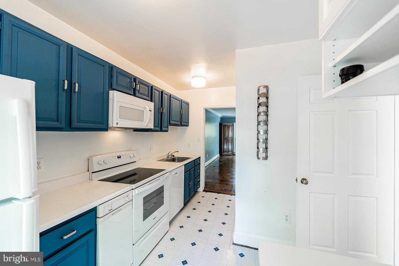 3237 Sutton Place Northwest, Unit A Washington, DC 20016 - Photo 20 of 54 Kichen with new appliances as of April 2024.