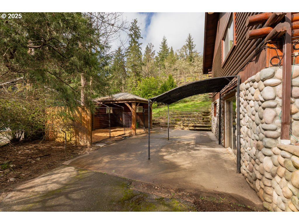 402 Northside Road Sutherlin, OR 97479 - Photo 27 of 46 a view of a house with a tree