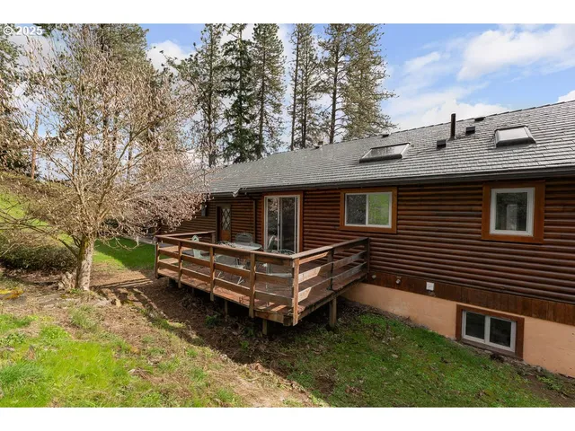 a view of outdoor space with trees all around