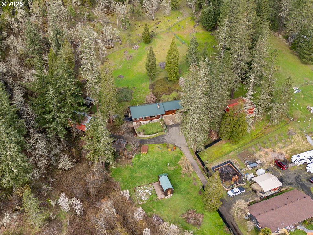 402 Northside Road Sutherlin, OR 97479 - Photo 4 of 46 an aerial view of residential houses with outdoor space