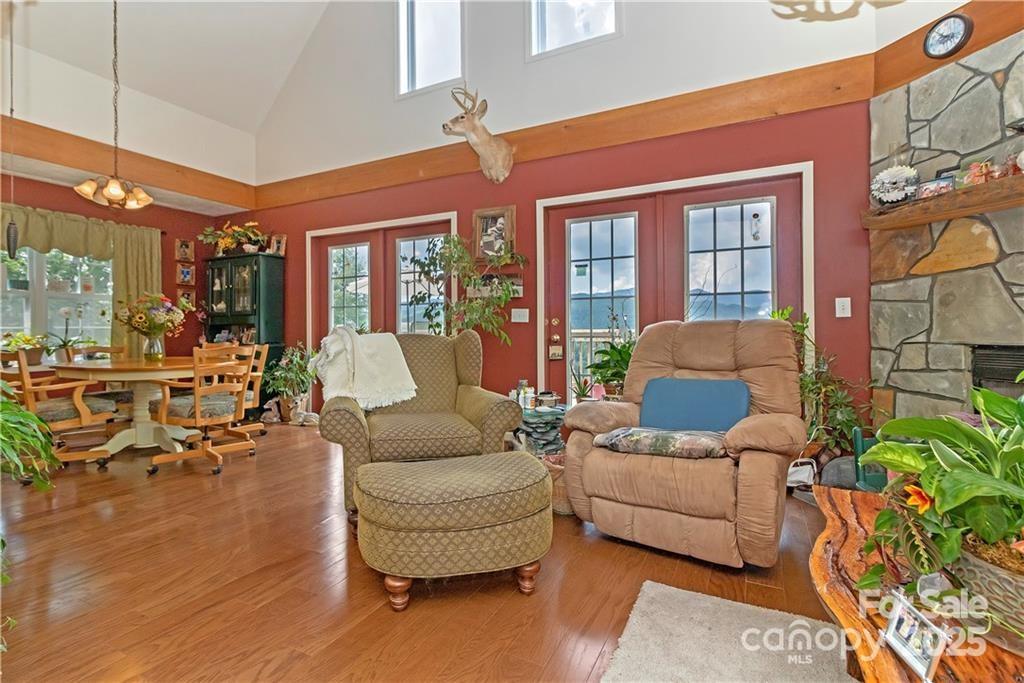 612 Old Home Place Road Tuckasegee, NC 28783 - Photo 14 of 42 a living room with furniture and a large window