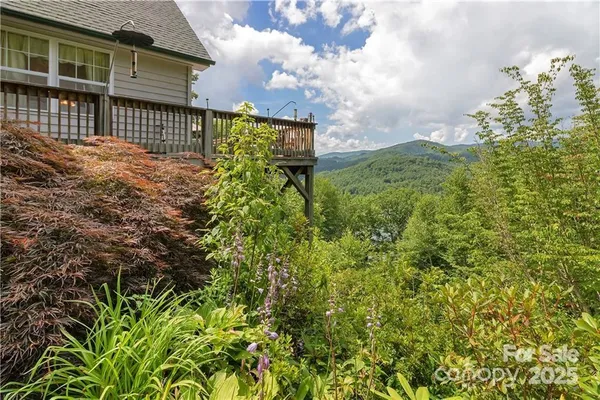 a balcony with yard