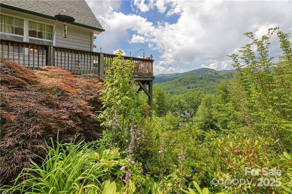 612 Old Home Place Road Tuckasegee, NC 28783 - Photo 8 of 42 a balcony with yard