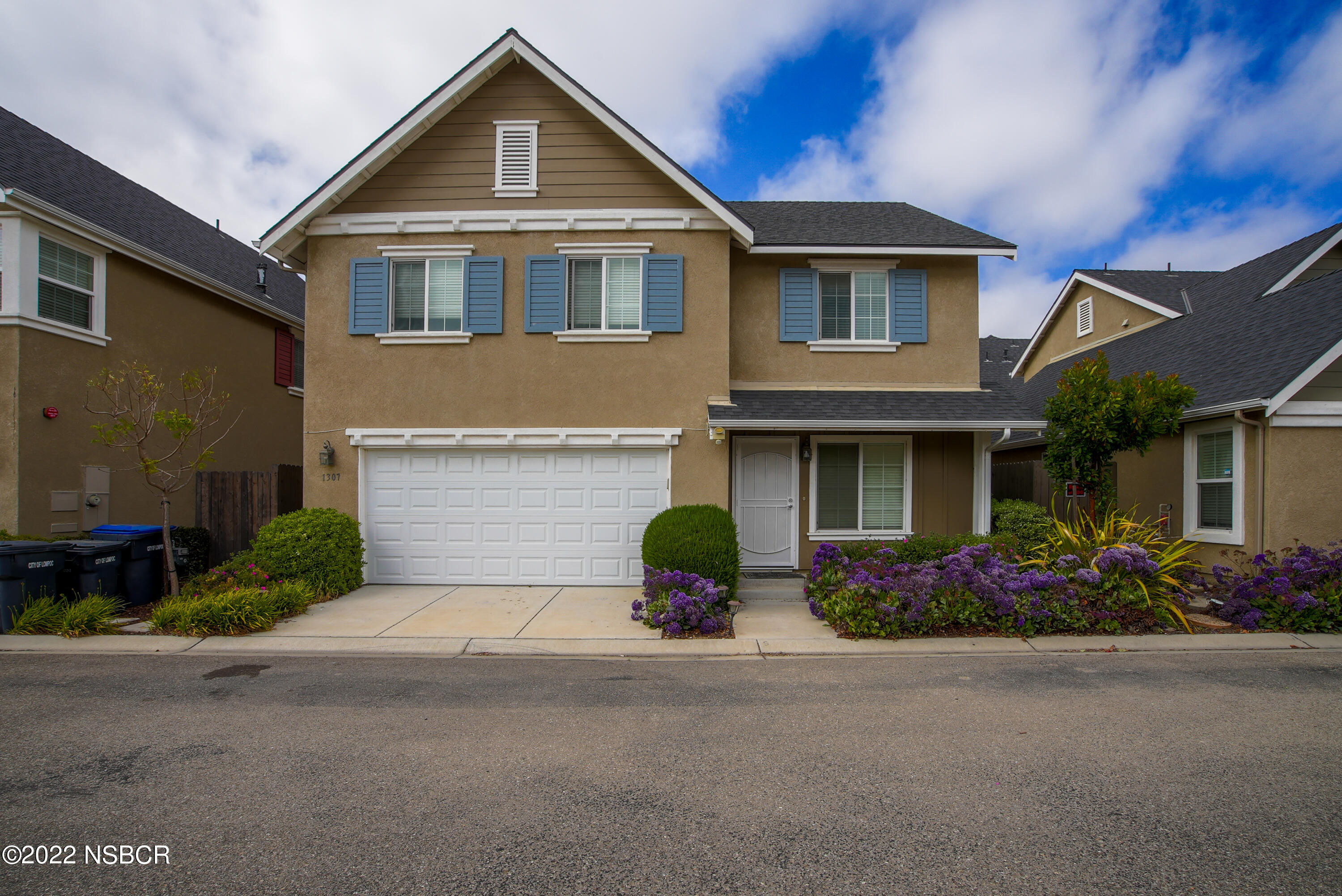 1307 Crown Circle Lompoc, CA 93436 - Photo 1 of 34 a front view of a house with a yard