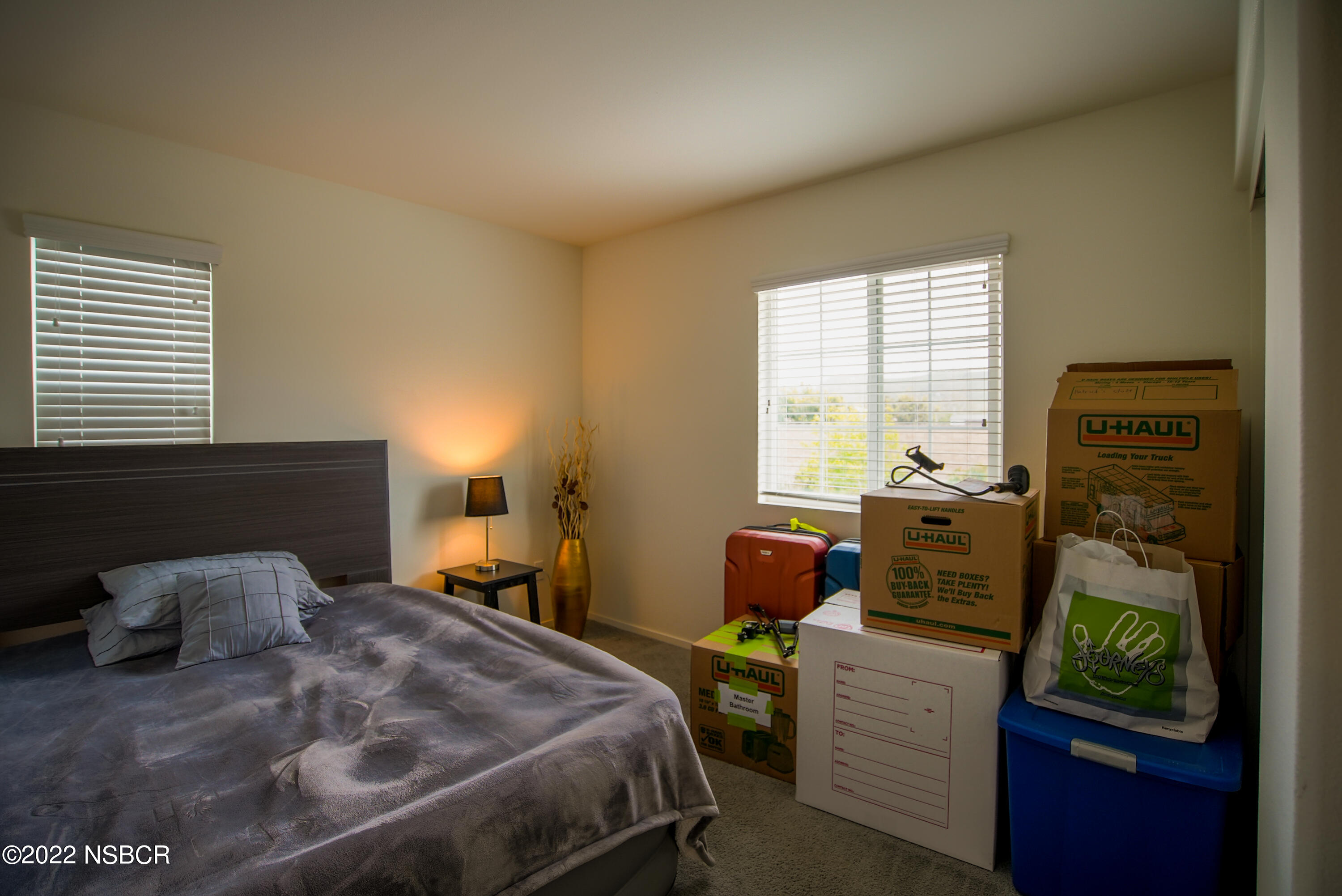 1307 Crown Circle Lompoc, CA 93436 - Photo 14 of 34 a bedroom with a bed and a window