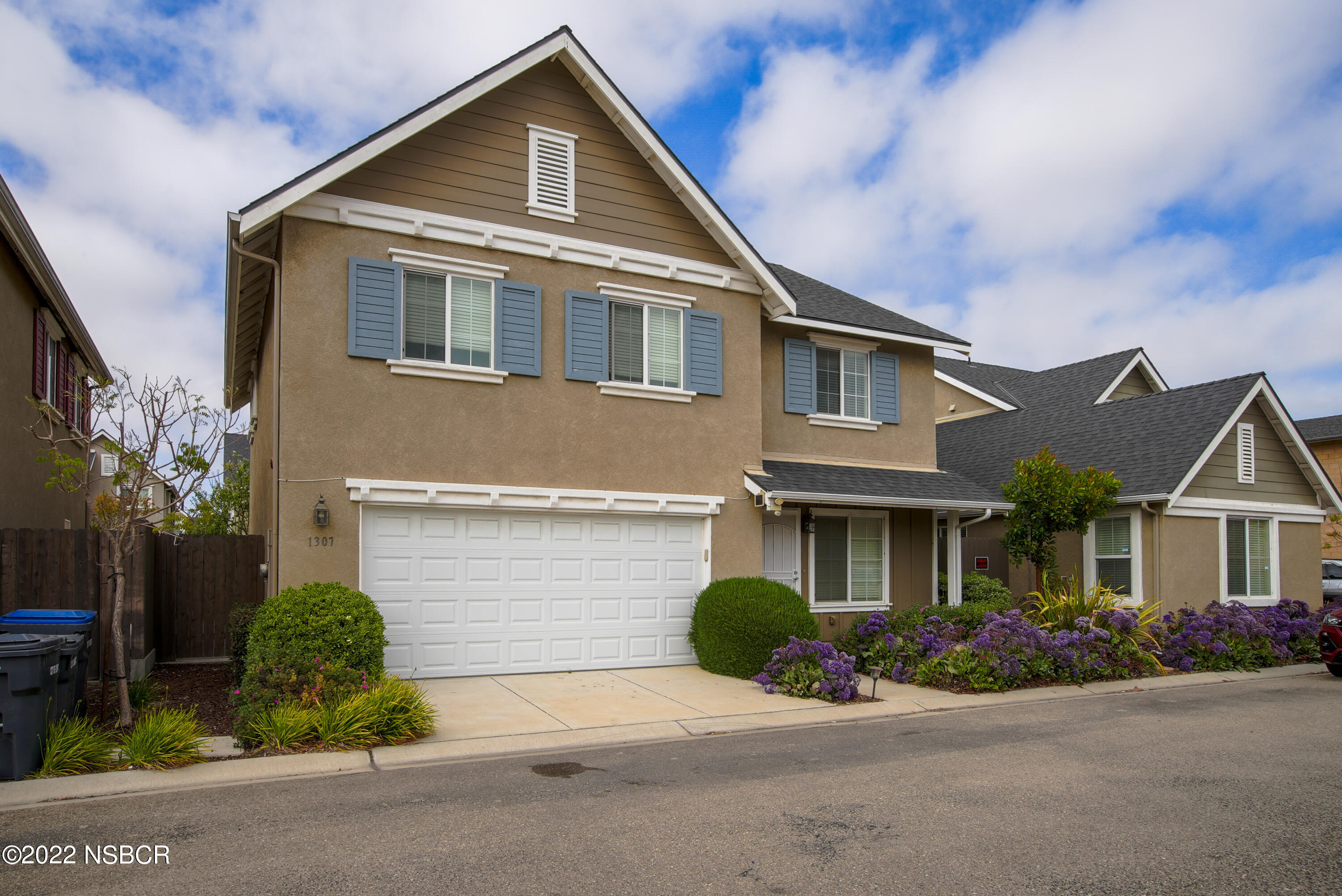 1307 Crown Circle Lompoc, CA 93436 - Photo 3 of 34 a front view of a house with garden